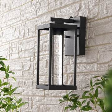 Juno 4.75" Industrial Vintage Iron/Glass Seeded Glass with Dusk-to-Dawn Sensor Integrated LED Outdoor Sconce - JONATHAN Y